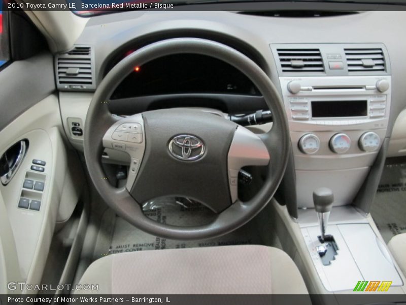 Barcelona Red Metallic / Bisque 2010 Toyota Camry LE