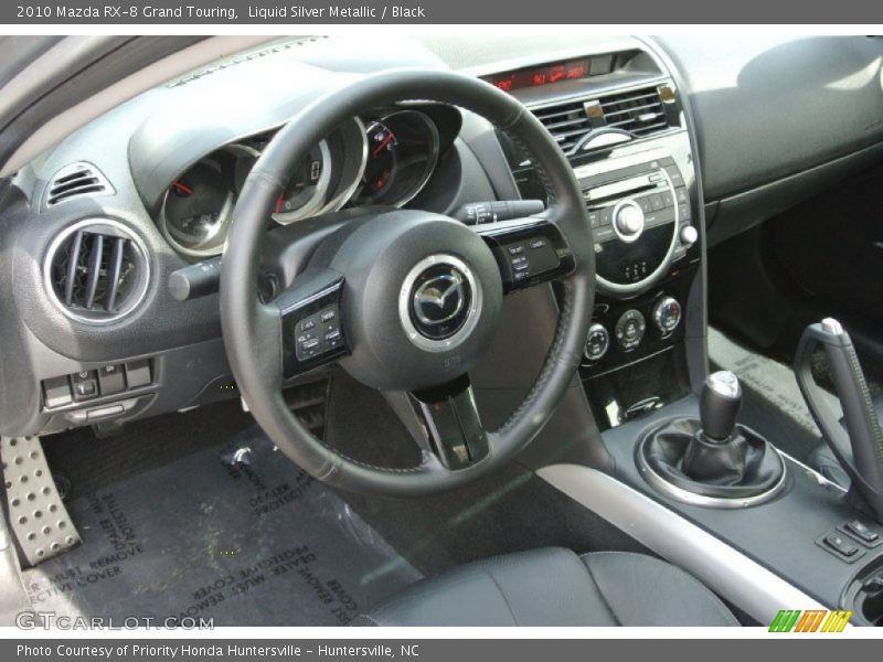 Dashboard of 2010 RX-8 Grand Touring