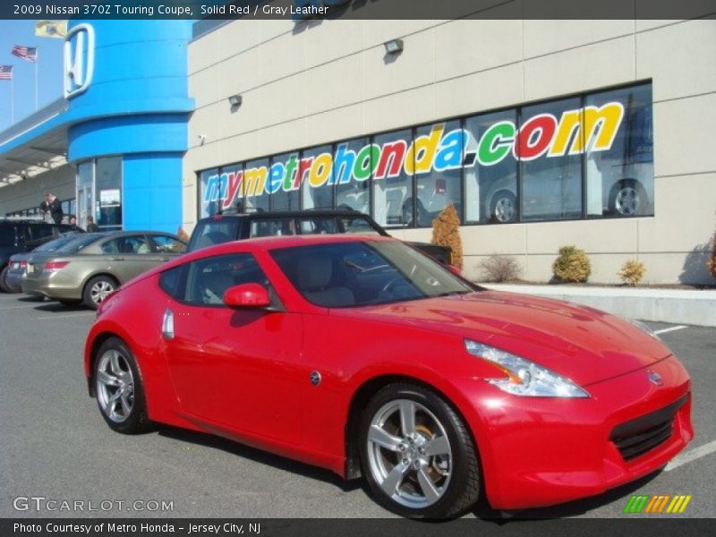 Solid Red / Gray Leather 2009 Nissan 370Z Touring Coupe