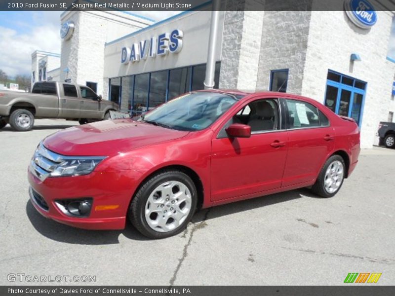 Sangria Red Metallic / Medium Light Stone 2010 Ford Fusion SE