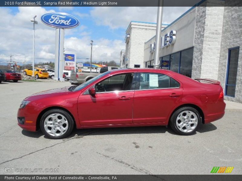 Sangria Red Metallic / Medium Light Stone 2010 Ford Fusion SE