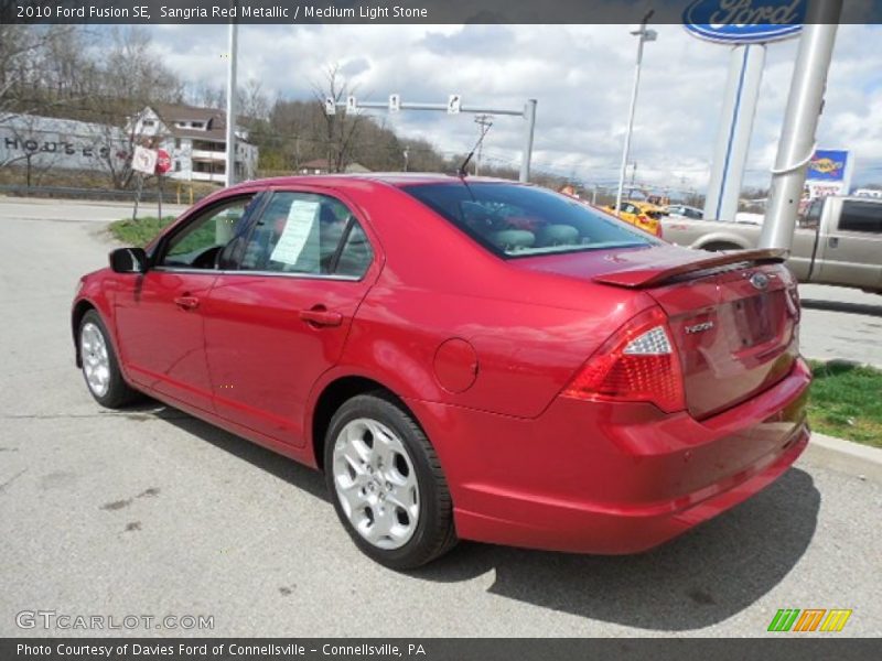 Sangria Red Metallic / Medium Light Stone 2010 Ford Fusion SE