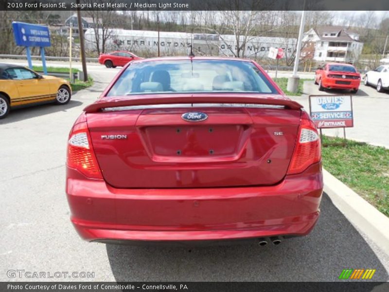 Sangria Red Metallic / Medium Light Stone 2010 Ford Fusion SE
