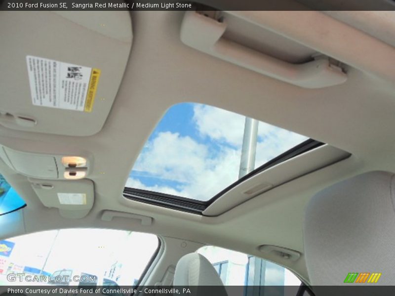 Sangria Red Metallic / Medium Light Stone 2010 Ford Fusion SE