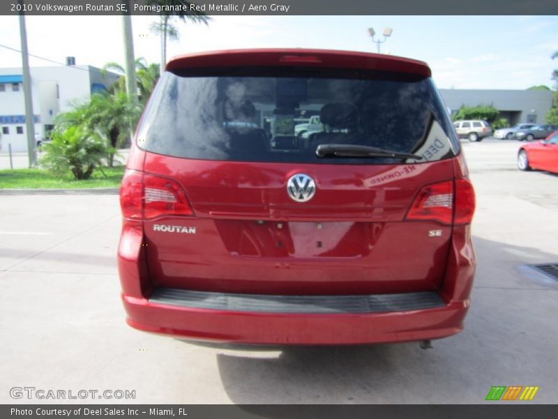 Pomegranate Red Metallic / Aero Gray 2010 Volkswagen Routan SE