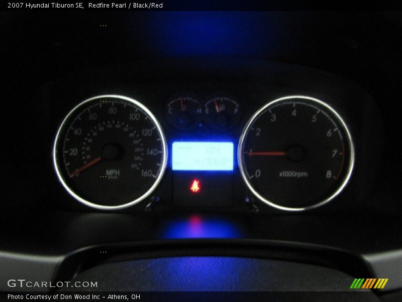 Redfire Pearl / Black/Red 2007 Hyundai Tiburon SE