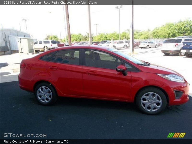 Race Red / Charcoal Black/Light Stone 2013 Ford Fiesta SE Sedan