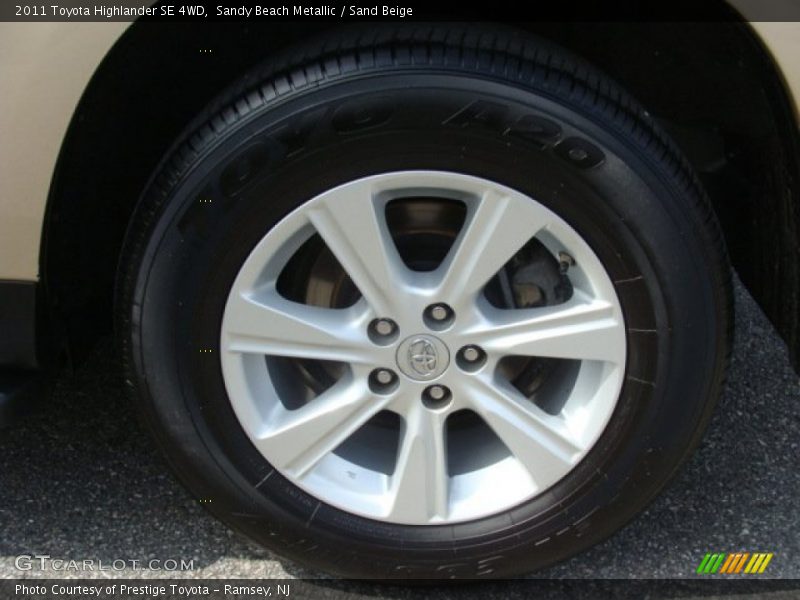 Sandy Beach Metallic / Sand Beige 2011 Toyota Highlander SE 4WD