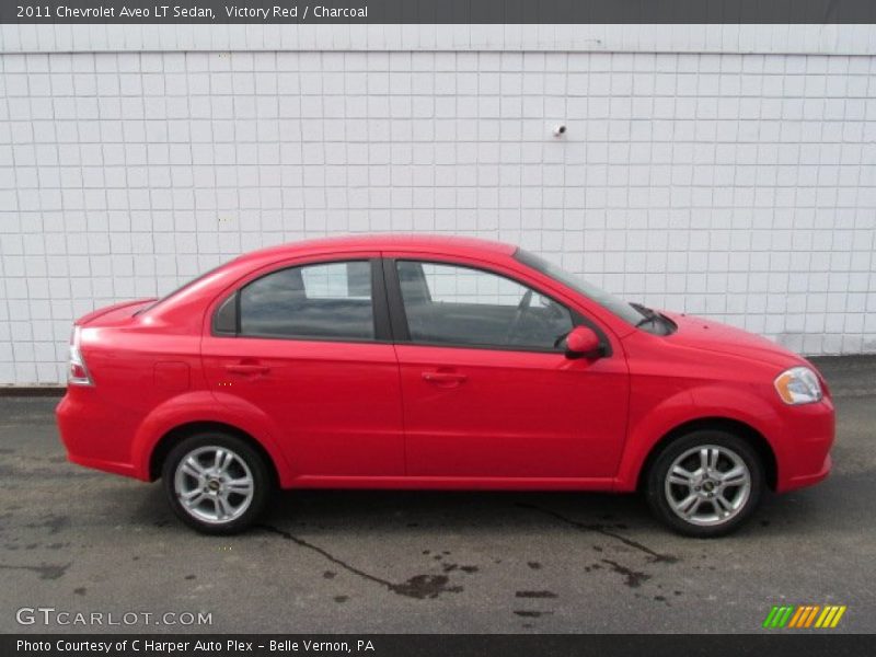 Victory Red / Charcoal 2011 Chevrolet Aveo LT Sedan