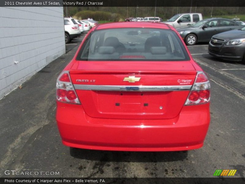 Victory Red / Charcoal 2011 Chevrolet Aveo LT Sedan