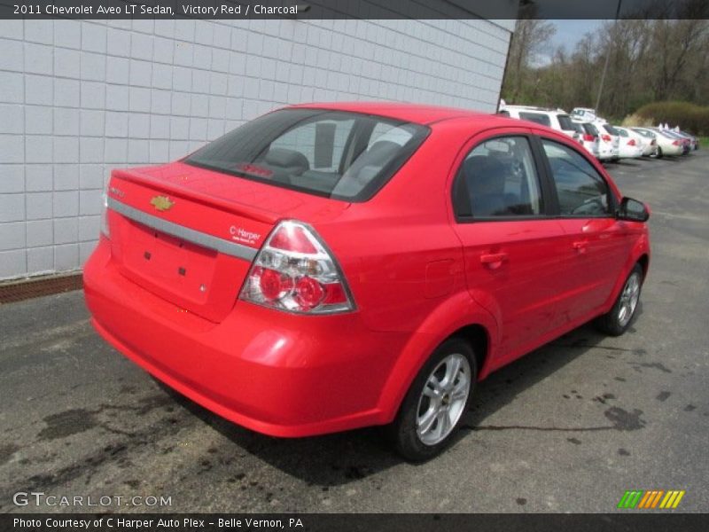 Victory Red / Charcoal 2011 Chevrolet Aveo LT Sedan