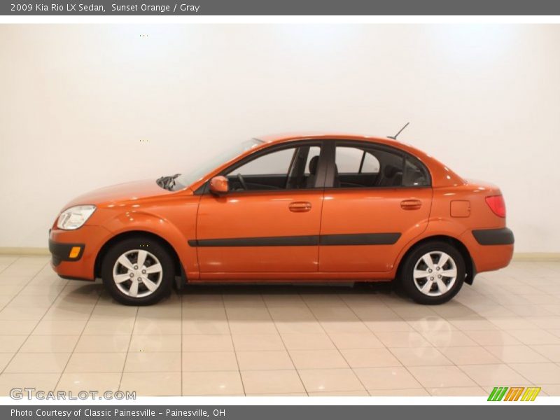  2009 Rio LX Sedan Sunset Orange