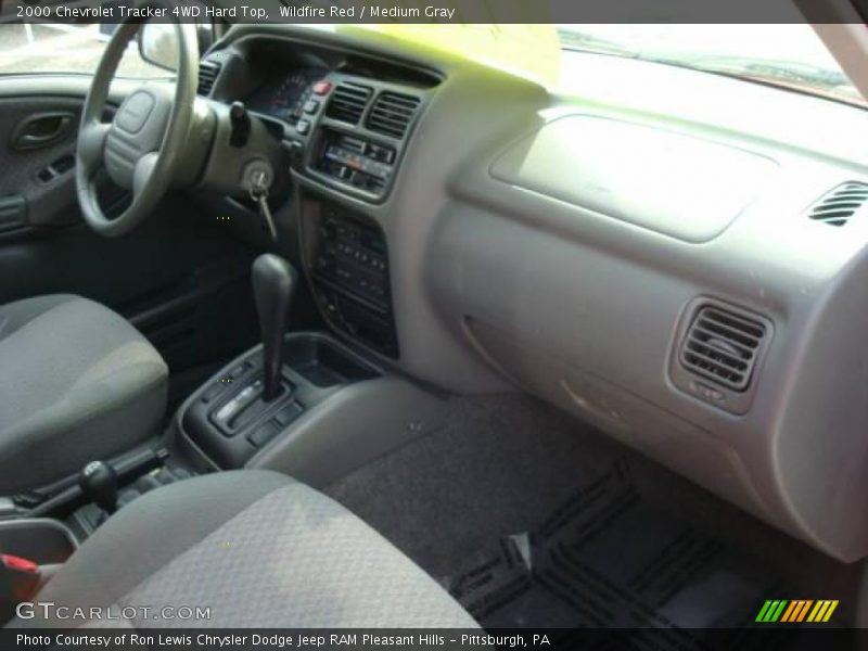 Wildfire Red / Medium Gray 2000 Chevrolet Tracker 4WD Hard Top