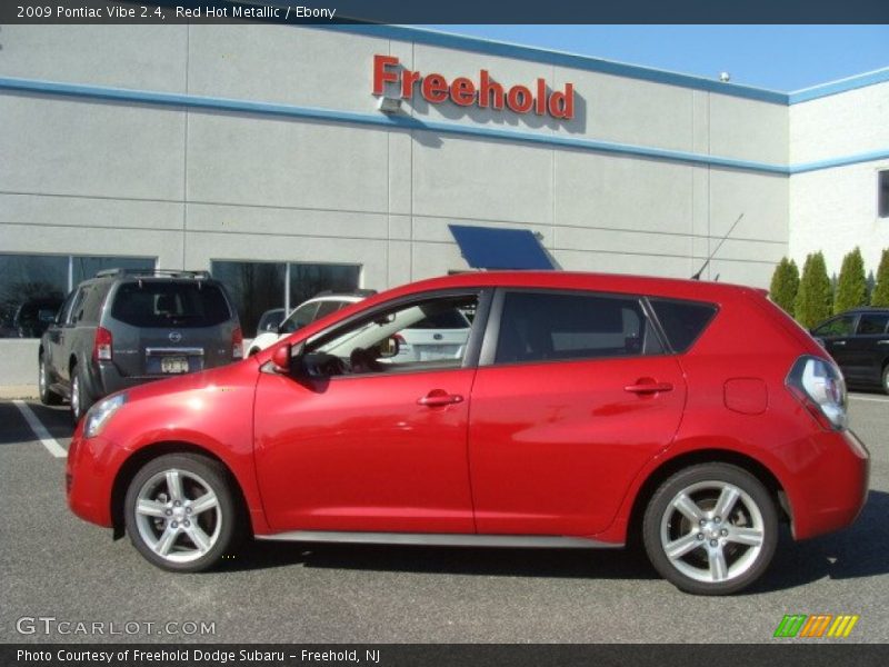 Red Hot Metallic / Ebony 2009 Pontiac Vibe 2.4