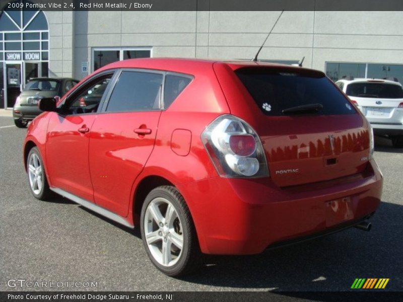 Red Hot Metallic / Ebony 2009 Pontiac Vibe 2.4
