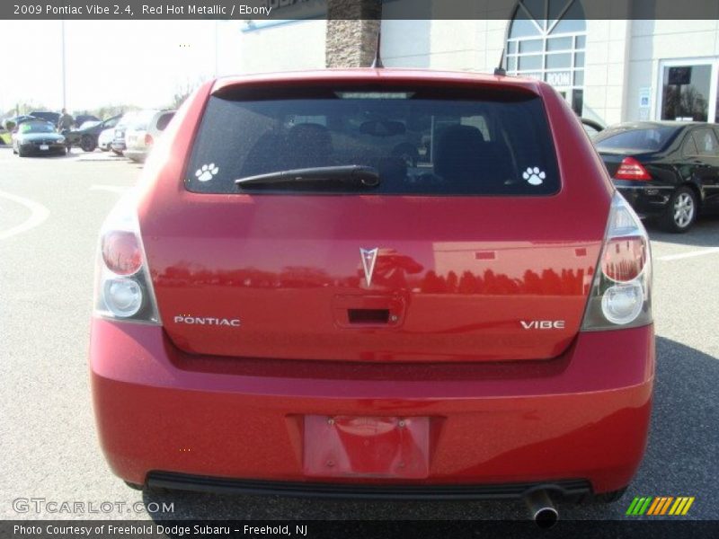 Red Hot Metallic / Ebony 2009 Pontiac Vibe 2.4