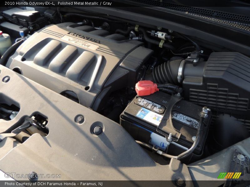Polished Metal Metallic / Gray 2010 Honda Odyssey EX-L