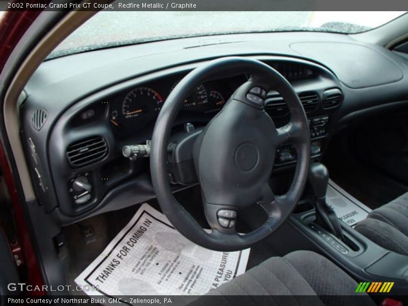 Redfire Metallic / Graphite 2002 Pontiac Grand Prix GT Coupe