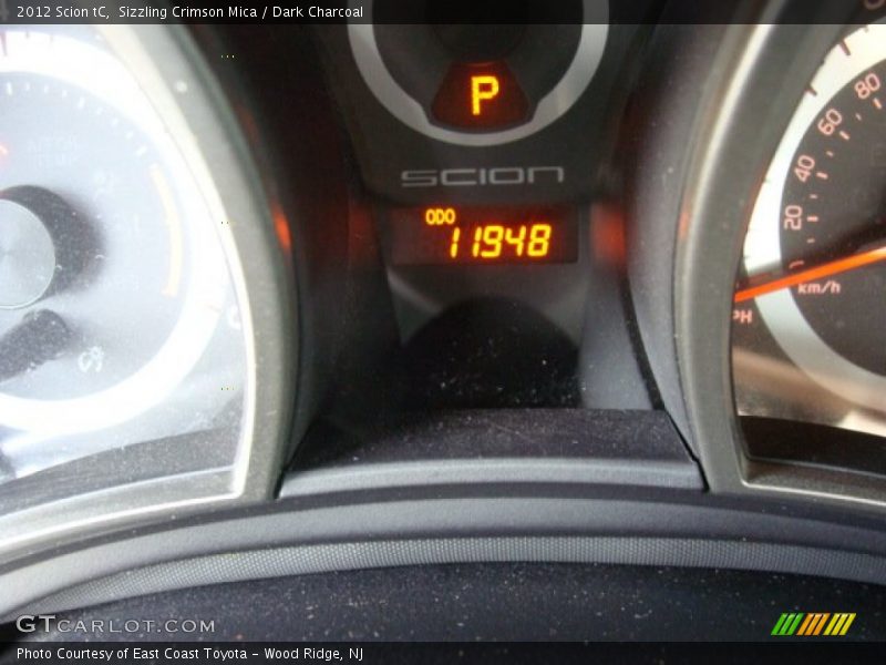 Sizzling Crimson Mica / Dark Charcoal 2012 Scion tC