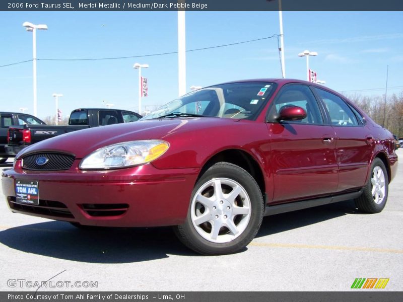 Merlot Metallic / Medium/Dark Pebble Beige 2006 Ford Taurus SEL