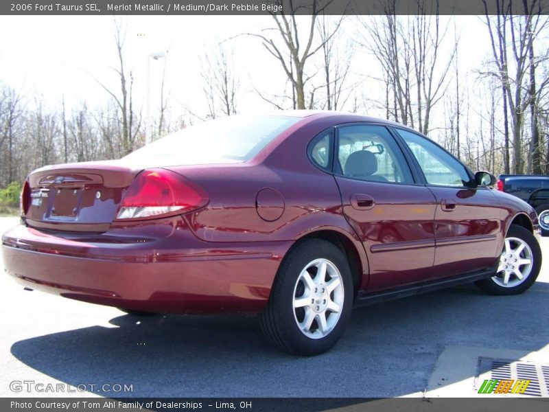Merlot Metallic / Medium/Dark Pebble Beige 2006 Ford Taurus SEL