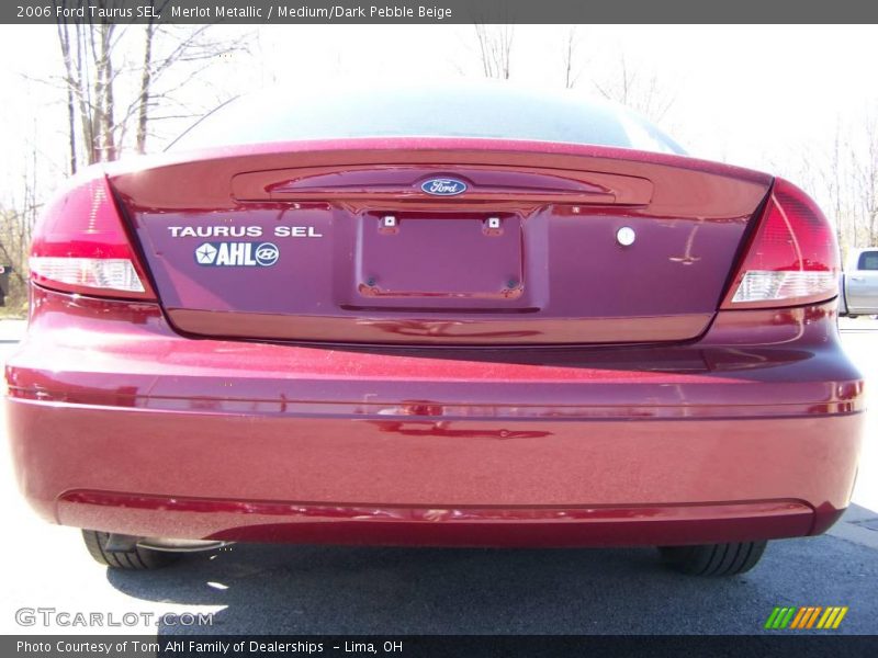 Merlot Metallic / Medium/Dark Pebble Beige 2006 Ford Taurus SEL