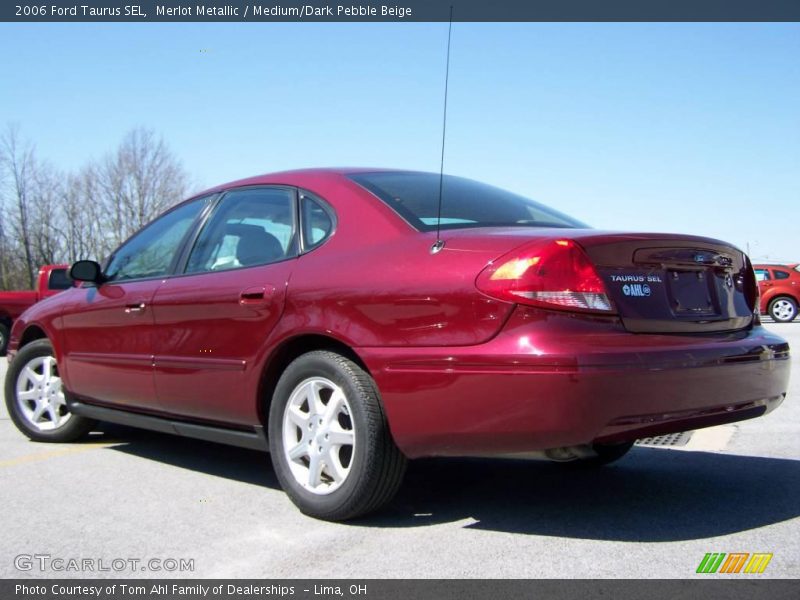 Merlot Metallic / Medium/Dark Pebble Beige 2006 Ford Taurus SEL