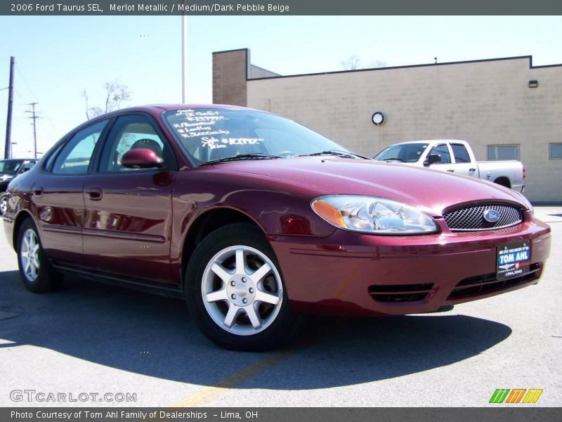 Merlot Metallic / Medium/Dark Pebble Beige 2006 Ford Taurus SEL