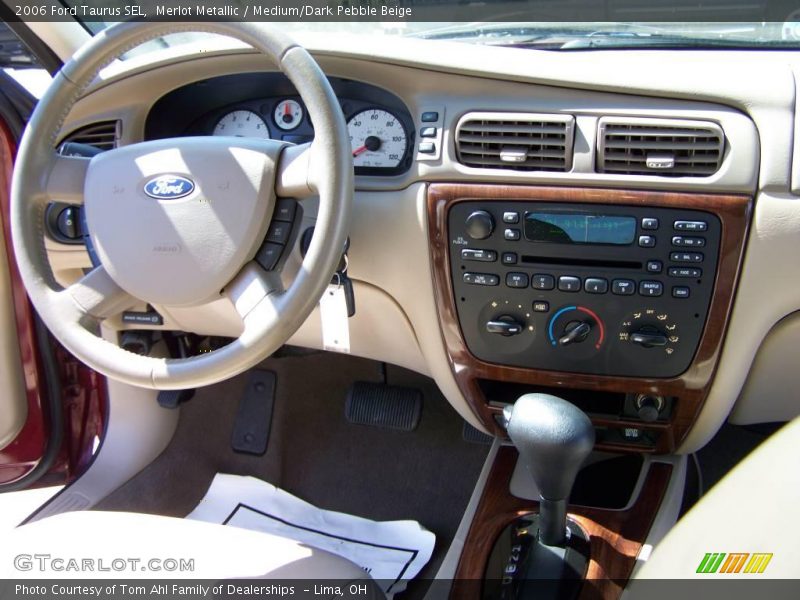 Merlot Metallic / Medium/Dark Pebble Beige 2006 Ford Taurus SEL