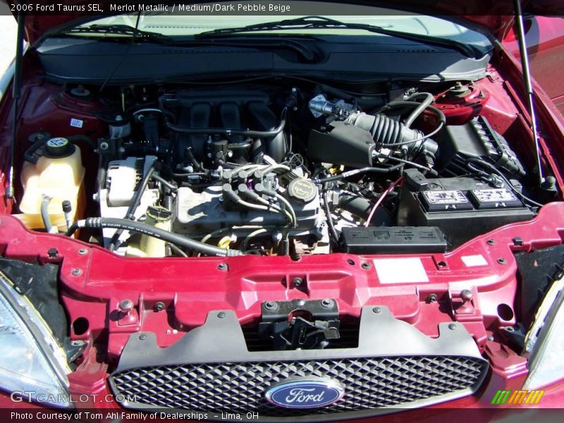 Merlot Metallic / Medium/Dark Pebble Beige 2006 Ford Taurus SEL