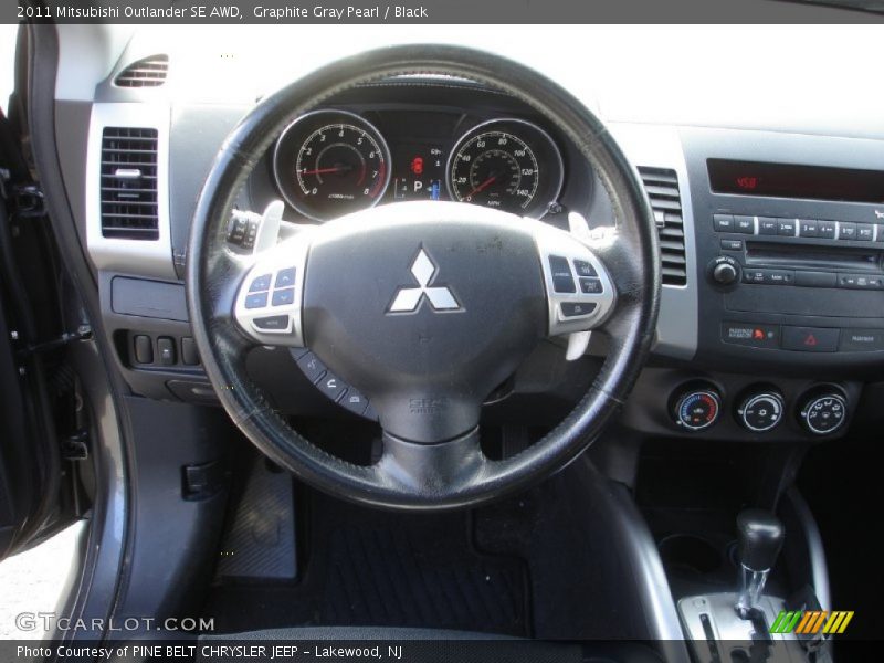 Graphite Gray Pearl / Black 2011 Mitsubishi Outlander SE AWD