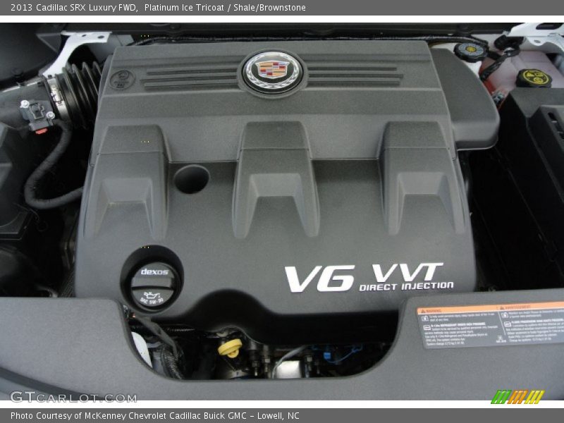 Platinum Ice Tricoat / Shale/Brownstone 2013 Cadillac SRX Luxury FWD