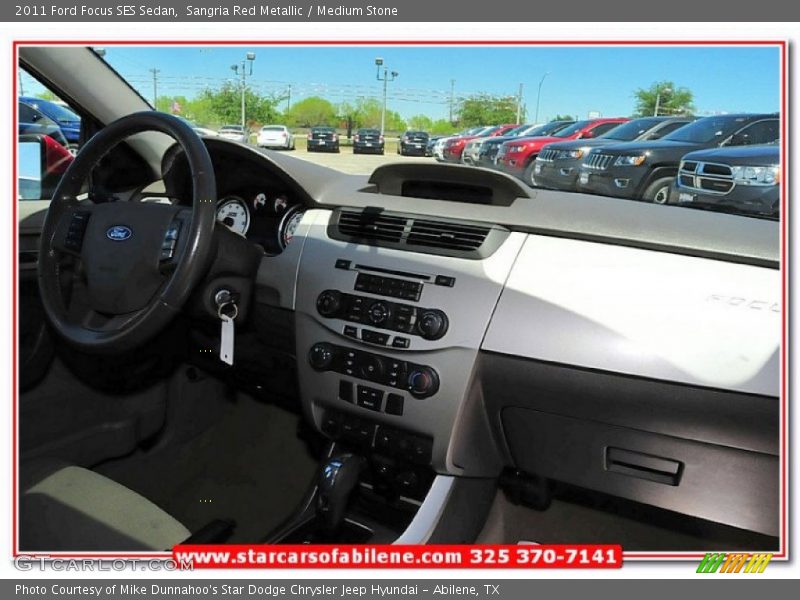 Sangria Red Metallic / Medium Stone 2011 Ford Focus SES Sedan