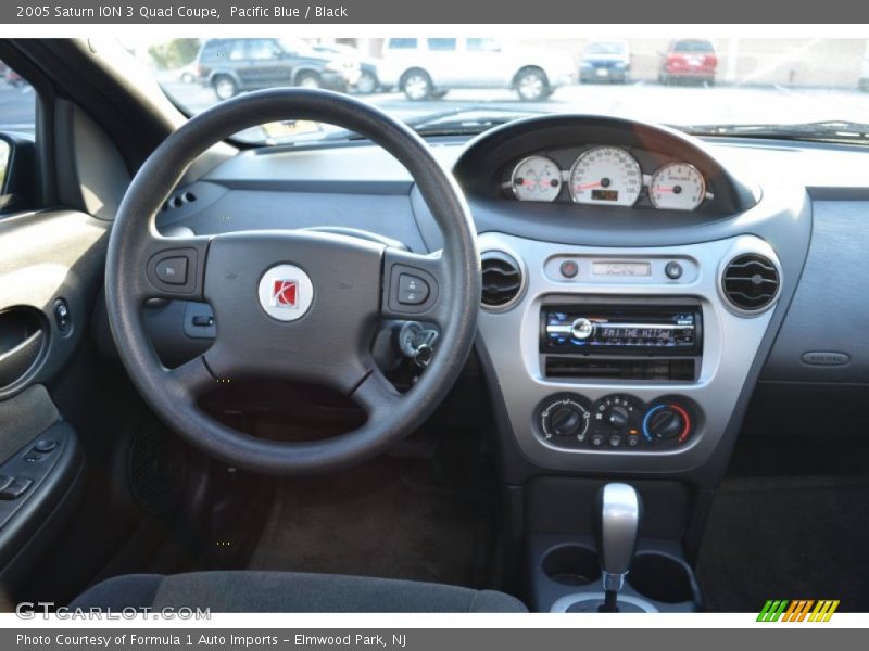 Dashboard of 2005 ION 3 Quad Coupe