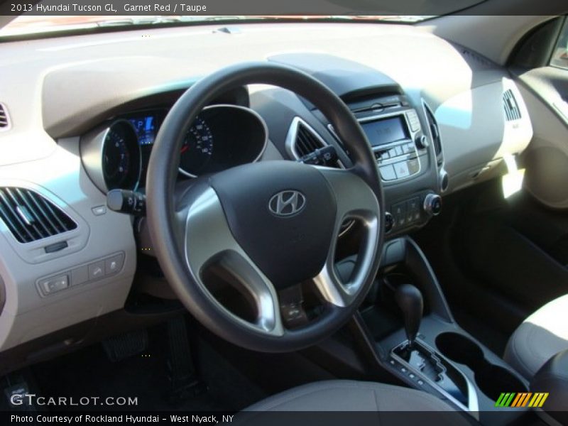 Garnet Red / Taupe 2013 Hyundai Tucson GL