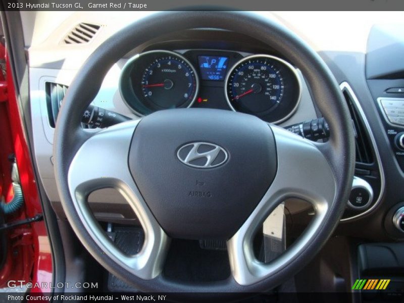 Garnet Red / Taupe 2013 Hyundai Tucson GL