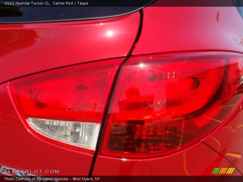 Garnet Red / Taupe 2013 Hyundai Tucson GL