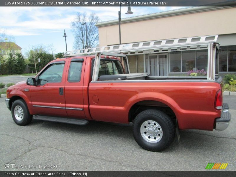 Bright Amber Metallic / Medium Prairie Tan 1999 Ford F250 Super Duty Lariat Extended Cab