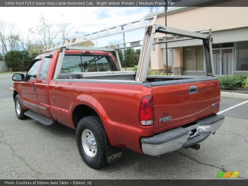 Bright Amber Metallic / Medium Prairie Tan 1999 Ford F250 Super Duty Lariat Extended Cab