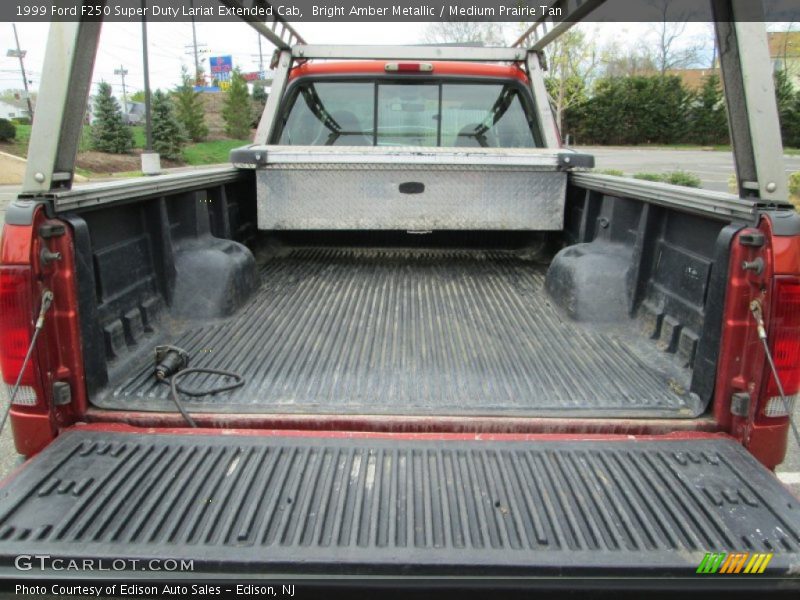 Bright Amber Metallic / Medium Prairie Tan 1999 Ford F250 Super Duty Lariat Extended Cab