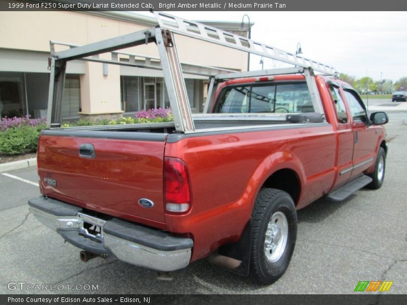 Bright Amber Metallic / Medium Prairie Tan 1999 Ford F250 Super Duty Lariat Extended Cab