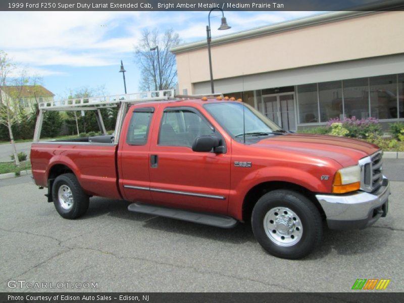 Bright Amber Metallic / Medium Prairie Tan 1999 Ford F250 Super Duty Lariat Extended Cab