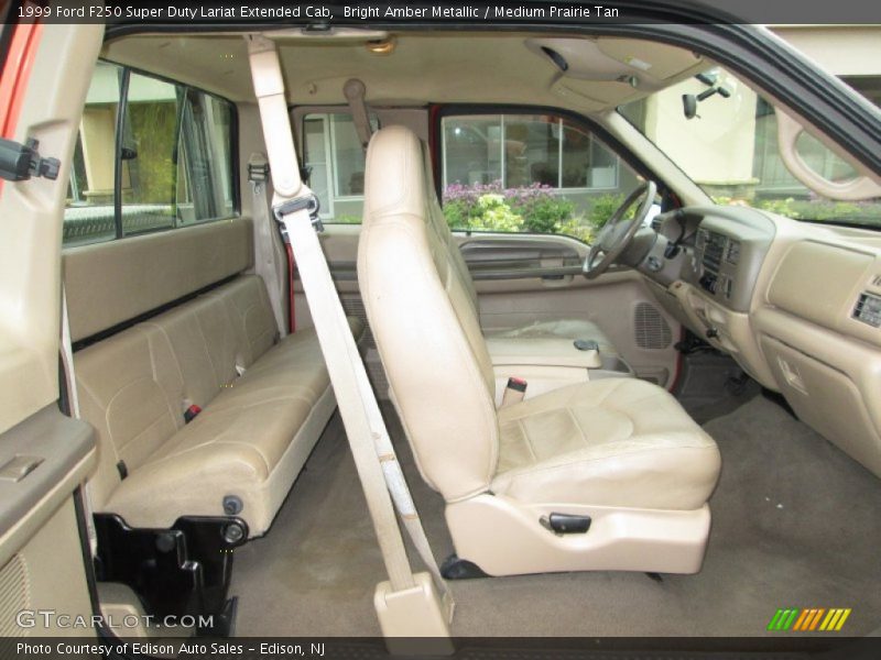 Bright Amber Metallic / Medium Prairie Tan 1999 Ford F250 Super Duty Lariat Extended Cab