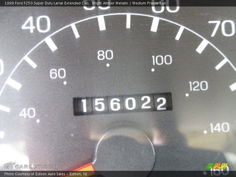 Bright Amber Metallic / Medium Prairie Tan 1999 Ford F250 Super Duty Lariat Extended Cab
