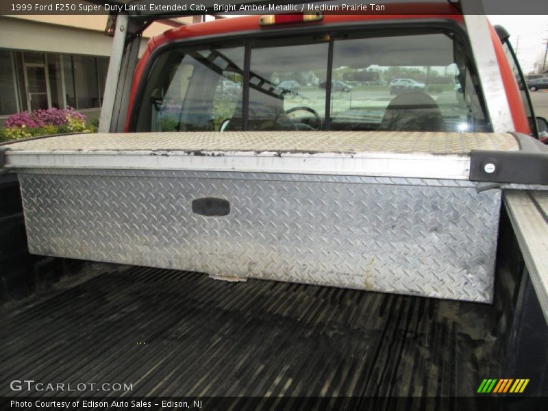 Bright Amber Metallic / Medium Prairie Tan 1999 Ford F250 Super Duty Lariat Extended Cab