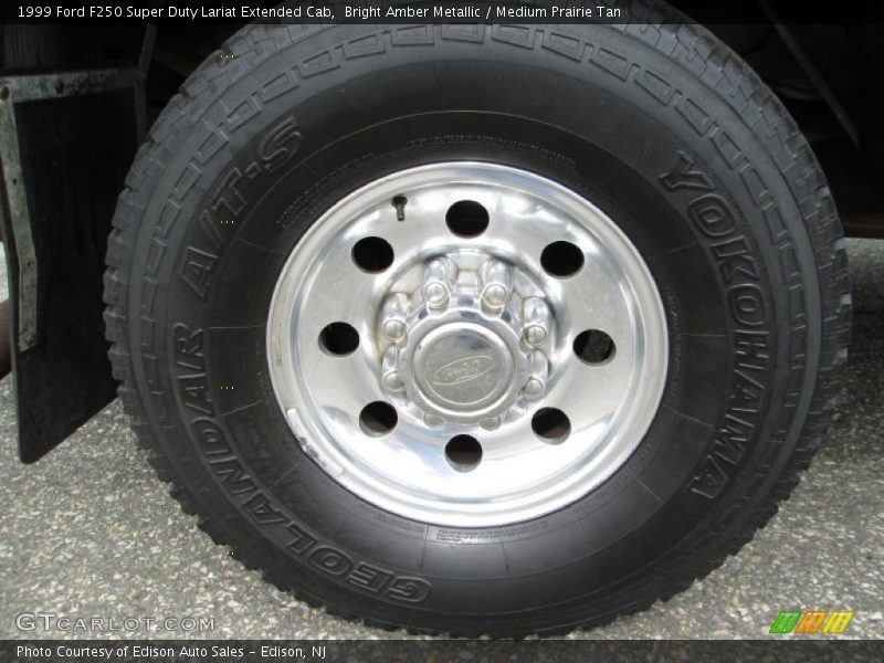 Bright Amber Metallic / Medium Prairie Tan 1999 Ford F250 Super Duty Lariat Extended Cab