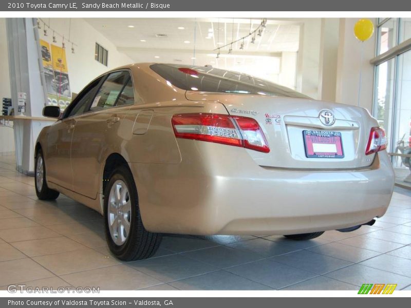 Sandy Beach Metallic / Bisque 2010 Toyota Camry LE