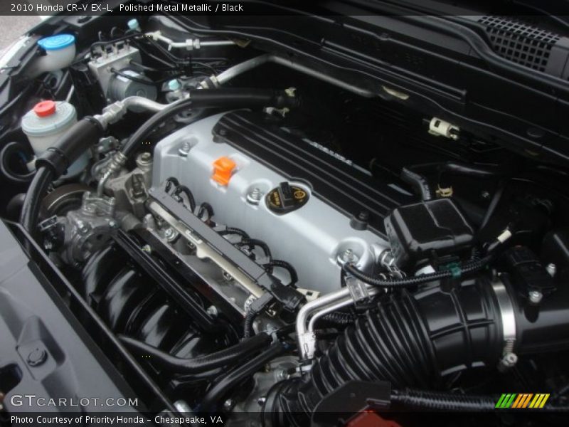 Polished Metal Metallic / Black 2010 Honda CR-V EX-L