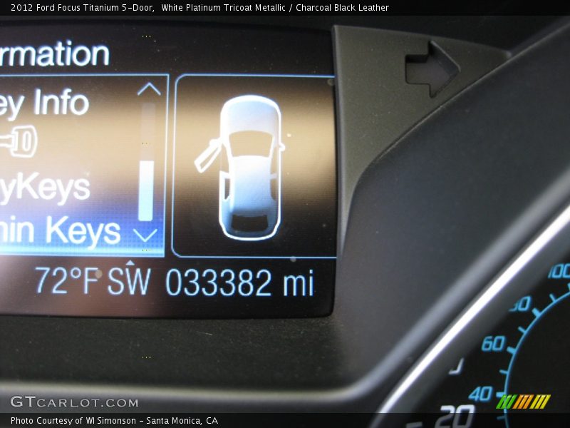 White Platinum Tricoat Metallic / Charcoal Black Leather 2012 Ford Focus Titanium 5-Door
