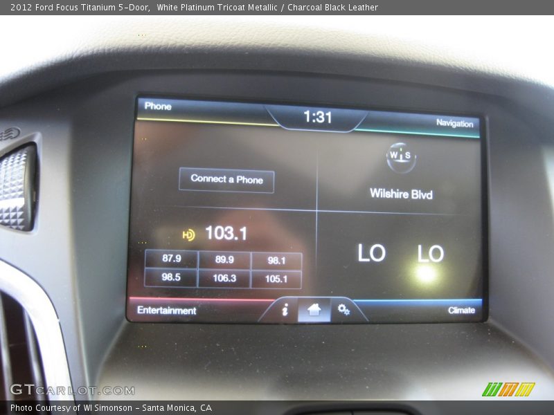 White Platinum Tricoat Metallic / Charcoal Black Leather 2012 Ford Focus Titanium 5-Door